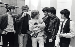 goo-goo-gjoob-goo-goo:  The Rolling Stones with their manager and producer, Andrew Loog Oldham, 1965.