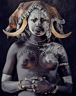 house-of-gnar:  Mursi tribe|Great Rift Valley &ldquo;The nomadic Mursi tribe lives in the lower area of Africa’s Great Rift Valley. Extreme drought has made it difficult to feed themselves by means of traditional cultivation and herding. The establishment