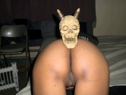 georgechaos:  Sexy ass bend over, long leg sexy amature dark skinned girl with my demon skull on my bed at Chaos Dungeon. Follow me for all original pics of all real amatures and Please Reblog me
