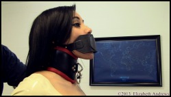 elizabethandrews:  @EnchantressSahr wearing an extreme posture collar and plug gag - www.clips4sale.com/38880/8894139 - Enchantress Sahrye : Latexed, Leathered, and Led