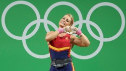 kakumei-no-tomoshibi:  onceuponaforbiddenfruit:  Let’s take a moment to appreciate the cuteness of the Spanish weightlifter, gold and bronze medal winner, Lidia Valentin.   Do you even (take a second to wink mid-)lift? 