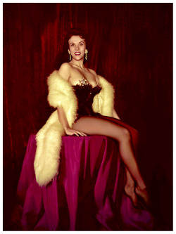 burleskateer: Caprice            (aka. Karen Cameron) Poses on stage at the ‘El Rancho’ nightclub in Los Angeles.. Photographed by  -  Elmer Batters 