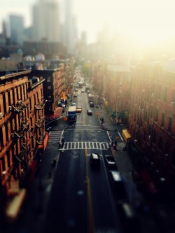 nythroughthelens:  Above New York City. Chinatown - Two Bridges. —- Sometimes it’s a shift in perspective that shifts everything around you. —- This is a view above Monroe Street in Chinatown. The neighborhood is also known as Two Bridges due to
