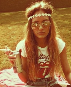 girl-hairstyles:  Hippie girl with long hair, floral headband, aviator sunglasses, drinking a bear, smoking a cigarette, and wearing a Rolling Stones tee shirt sitting on a blanket in some grass. Follow for more girls with great hair