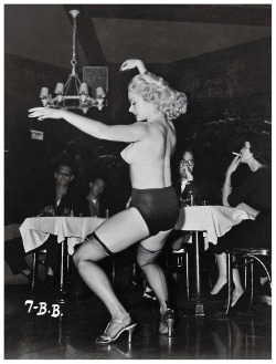 Rita Grable Busts a few moves, during a performance at an unidentified 50’s-era nightclub..
