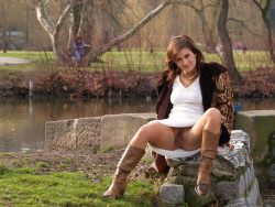 carelessinpublic:  In a park in a short dress and showing her hairy pussy