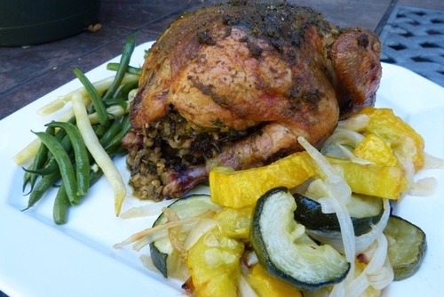 herb roasted chicken on plate with squash and green beans