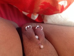 pussymodsgalore  VCH piercing with barbell, and outer labia piercings with rings. 