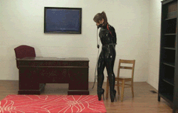 elizabethandrews:  GIF: I walk from the chair to the desk in my ballet boots. www.clips4sale.com/38880/8087701 - Elizabeth Andrews : Latex Catsuit, Armbinder, Ballet Boot Training  