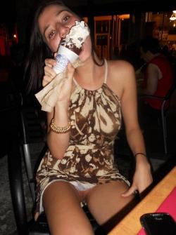 upskirtbabes2:  Licking her ice cream with no panties on … 