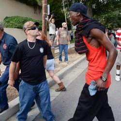 revolutionary-mindset:  Black man making KKK member piss his pants! 