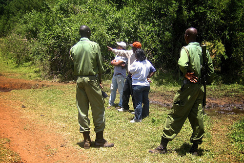 Lucas pointing out the forest boundaries to Daniel and Jobita – the KFS surveyor. Two KFS rangers accompanied us are shown in the foreground.