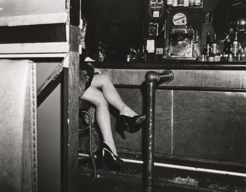 paolo-streito-1264:Weegee. Woman on a Bar Stool, New York City c.1940. 