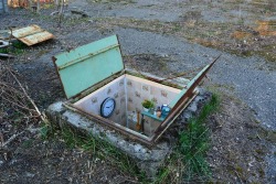 crypto-bsessed:  sixpenceee:  In this new series of outdoor installations artist Biancoshock has turned abandoned manhole covers on the streets of Milan into cramped miniature rooms complete with hanging artwork, kitchen utencils, and tiled walls. Titled