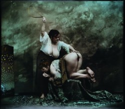 spankingnuns:  Photo by Jan Saudek: Landlady and Maid (1992)SPANKING NUNS“All of you guys who followed my first Tumblr for the sex-stuff but aren’t following Spanking Nuns because it’s nothing BUT sex-stuff, well, you’re not fooling anyone but