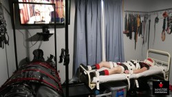 atmydisposal:Two #bondage toys: one in #leather, the other in #latex. With entertainment for Me in the background. Both completely immobilized.