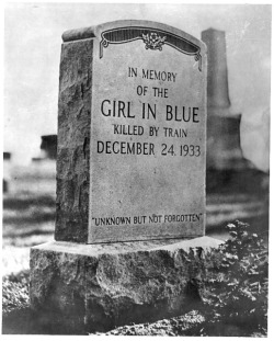 &ldquo;In memory of the girl in blue, killed by train, December 24, 1933 - unknown but not forgotten.&rdquo; The newer stone on the ground reads: “Girl in Blue identified as Josephine Klimczak, December 24, 1933.” Located in the back plots of Willoughby