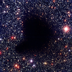 just–space: Dark Molecular Cloud Barnard 68  : Where did all the stars go? What used to be considered a hole in the sky is now known to astronomers as a dark molecular cloud. Here, a high concentration of dust and molecular gas absorb practically all
