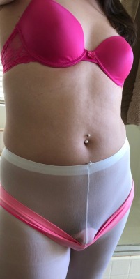 herhappysissywife:  sissygirlj:And then we complete the look with a hot pink bra!!! &lt;3 Sissy PiercingsPretty navel piercings complement a chastity device very well.  Anything to adorn a sissy, marking them as your property.