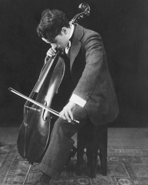 Charlie Chaplin playing the cello, ca. 1920. The comic actor used his downtime to practise the cello and violin, writing in his autobiography that he would play for four to six hours a day. Nudes &amp; Noises  