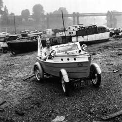 June Lander -  Clive Talbot Of Chiswick, London, in his car built with the body of a boat, 1959.