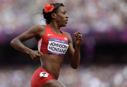 sixsecondshigh:  Why Alysia Montano wears a flower in her hair during every race. Even though she grew up playing football, shooting hoops and running races against all the boys in her neighborhood, U.S. 800-meter champion Alysia Montano never wanted