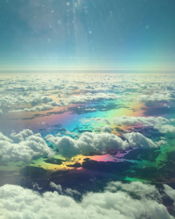 phindsy:  painandcats:  [two images taken from above the clouds. A rainbow is visible below the clouds.]  The sky is gay confirmed 