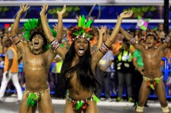   Rio Carnival Brazil 2014, via The World Festival.    Revellers of the Mangueira samba school participate in the annual Carnival parade in Rio de Janeiro’s Sambadrome, March 3, 2014. (Photo by Pilar Olivares/Reuters)  