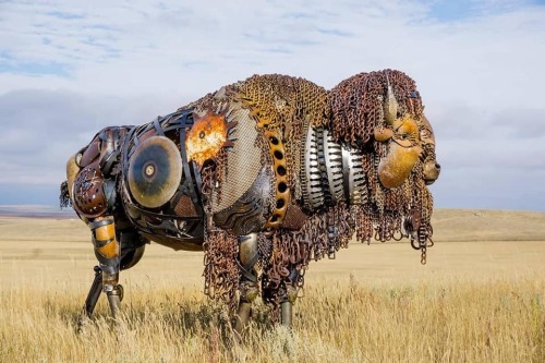 alanspazzaliartist:  South Dakota sculptor John Lopez creates spectacular sculptures made of old farm equipment. His scrap creations reflect the legends and images of his prairie land.