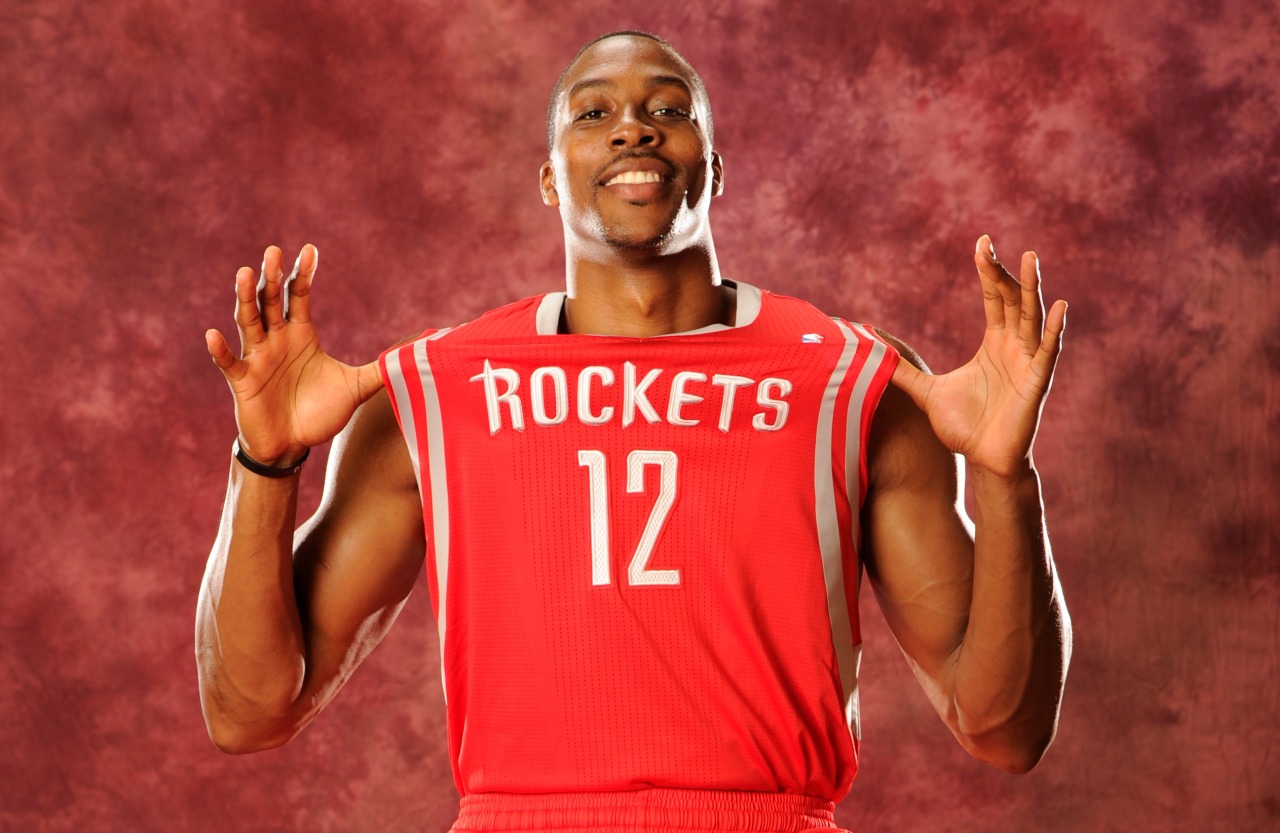 Dwight Howard of the Houston Rockets poses for a photograph in his away jersey in Houston, Texas. (Photo by Bill Baptist/NBAE via Getty Images) 