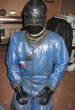northernleather: FaggotGimp:  Suffering plugged and gagged in a drysuit over its pink latex catsuit. It was pretty warm in there 