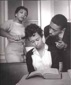 jasminmo:  historicporn: This photo is of a girl training to ignore white people pulling on her hair and blowing smoke in her face. Pretty morbid, but what an amazing photo. 
