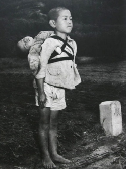specialmcb:  sixpenceee:  THE BROTHERS AT NAGASAKI Probably one of the most intense picture I have ever posted. Extremely depressing content. The photograph above was taken by US Marines photographer Joe O’Donnell shortly after the bombing of Nagasaki.