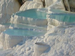 hxrdxore:  earth-phenomenon:  Pamukkale, 19 km (12 miles) north of Denizli, is Turkey’s foremost mineral-bath spa because of its natural beauty: hot calcium-laden waters spring from the earth and cascade over a cliff. As they cool they form dramatic