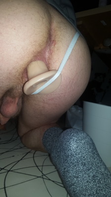 buttplugsndildos:  Using my smaller dildo as a butt plug with some string to hold it in