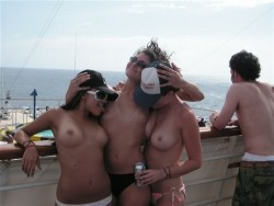 naked-party-girls:  I’ve been on a lot of cruises, but never have I seen three girls topless and licking each others nipples on the deck.  I need to talk to my travel agent. Real Girlfriends Doing Crazy Shit!