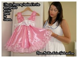 mistressandtranslesbiannatalie:So I bought him a pretty Sissy maids dress to match his pink cage and high heels.. It’s just short enough to see his chastity cage poking out.. Mistress likes to hear him work so I added a couple of bells, and a locking