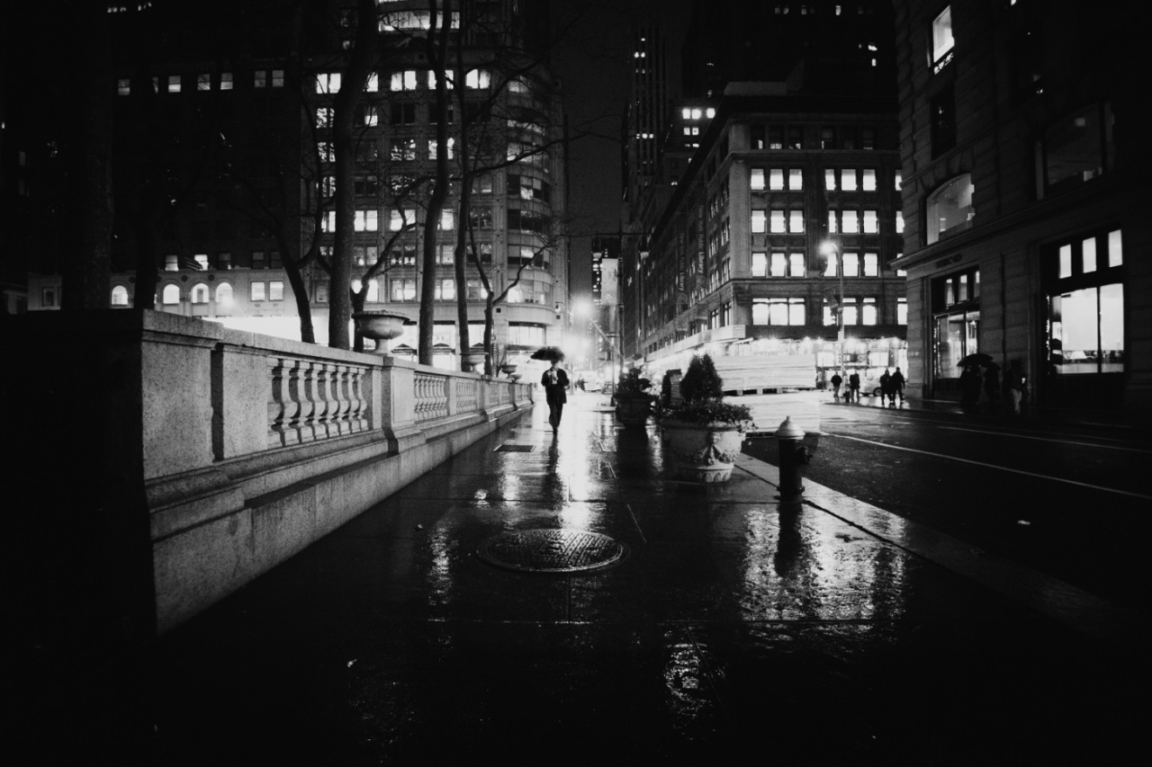New York City - Rain at Night When I first started delving into photography, one of the earliest conundrums I remember reading about involved the debate between technical perfection and artistic license. It always struck me as an odd topic, particularly since I have always approached my photography as a means to express emotion and mood rather than a way to highlight technical prowess. It&#8217;s difficult to say that there is one right way to approach art since all art is subjective. It&#8217;s important though to figure out what you are trying to express. Are you trying to express a&#8230;continue reading here&#8230; &#8212;- This is my weekly blog post to PDN&#8217;s Emerging Photographer’s Blog. —- Enjoy! —- View large: "New York City - Rain and Wet Sidewalks" in my photography portfolio here, Gear List, Travel Blog, email me, or ask for help.