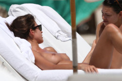toplessbeachcelebs:  Yaya Kosikova (Model) sunbathing topless in Miami Beach (March 2011) 