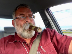 daddyandcubby2:  Only two things Daddy likes better than cigars