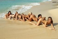swingersvacations:  Nude beach daisy chain!! 
