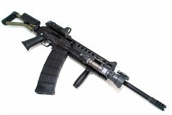 brandon10977:  The Saiga-12 is a 12-gauge shotgun available in a wide range of configurations, visually patterned after the Kalashnikov series of assault rifles. Like the Kalashnikov rifle variants, it is a rotating bolt, gas-operated gun that feeds from