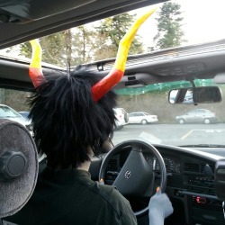 aj-viators:  dave-striders-dick-hole:  mama-gamzee:  dave-striders-dick-hole:  tobirion:  My favourite part of the con so far. Gamzee had to open the sun roof for his horns when we drove to Starbucks.  all i can think of is: i see you driven round town