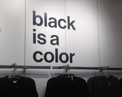 Yes it is and goes with everything. Love black