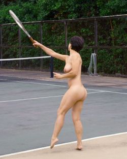 Nude tennis with well developed athletic legs.