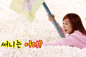 Jessica swimming in a sea of foam