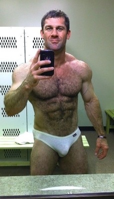 musclsvg:  Locker room shot of hairy, hard body Chad Taylor aka Chizzad.  A fantastic specimen with incredible definition right down to the cock in his bulging, skant brief.  Photo retouching by Musclesavage from original on Flickr - Photostream:  Carry