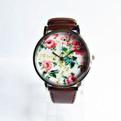 wickedclothes:  Floral Vintage Style Watch Crafted entirely by hand, this vintage style watch features a floral patterned face. A great accessory for spring time. Leather watch band is fully adjustable in size. Sold on Etsy.