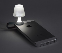 dailycoolgadgets:  Luma - Mobile Phone Night LightThis tiny lampshade will turn any smartphone into a fun and stylish  night light. Just cling it onto your phone, launch your flashlight app,  and let there be light!