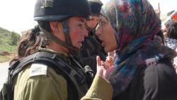   “LOOK INTO MY EYES AND GET OUT OF MY LAND!&ldquo; (via Johayna جهينة خالدية)  A Palestinian woman facing off against a piece-of-shit IDF soldier. Western feminists need to STOP heralding female IDF soldiers as “feminists” or “modern